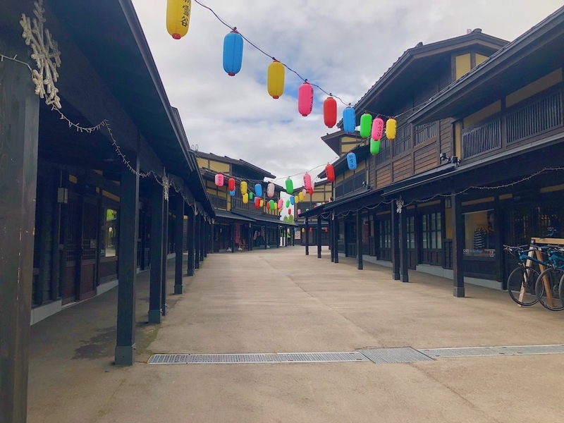 The author's own June photograph of the village walkway near Hilton Niseko Village