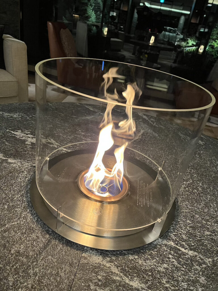 The author's own photograph of a fire feature in the Ritz-Carlton Reserve lobby